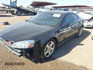 2007 Pontiac Grand Prix GXP with VIN 2G2WC58C571226261, listed as a IAAI auction lot 41487187 with 133,038 mi miles and . Bid and sale history available at DreamBid. Image 2.