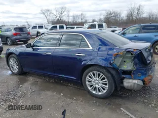 2014 Chrysler 300 C with VIN 2C3CCAKG2EH273209, listed as a IAAI auction lot 41955858 with 112,742 mi miles and . Bid and sale history available at carsss.com. Image 3.