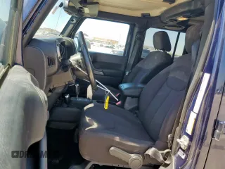 2013 Jeep Wrangler Unlimited Sport with VIN 1C4HJWDG2DL620654, listed as a Copart auction lot 52704645 with 133,932 mi miles and Clean title. Bid and sale history available at DreamBid. Image 7.