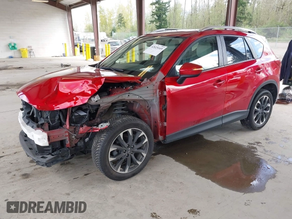 2016 Mazda CX-5 Grand Touring with VIN JM3KE4DY3G0688062, listed as a IAAI auction lot 42025169 with 59,867 mi miles and . Bid and sale history available at carsss.com. Image 2.