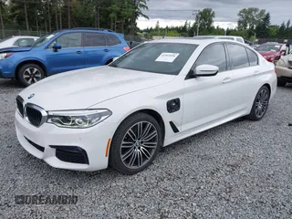 2019 BMW 5 Series 530e with VIN WBAJA9C57KB389401, listed as a IAAI auction lot 42565098 with 52,343 mi miles and . Bid and sale history available at DreamBid. Image 2.