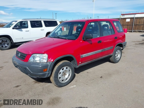 1999 Honda CR-V LX with VIN JHLRD1841XC071583, listed as a IAAI auction lot 41657213 with 208,874 mi miles. Bid and sale history available at carsss.com. Image 2.