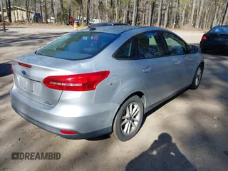 2016 Ford Focus SE with VIN 1FADP3F25GL296350, listed as a IAAI auction lot 41666826 with 125,898 mi miles and . Bid and sale history available at DreamBid. Image 4.