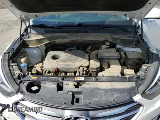 2017 Hyundai Santa Fe 2.4L z VIN 5XYZUDLB7HG388382, wystawiony jako Copart lot #57167315 z przebiegiem 128 724 mil mil oraz Szkoda całkowita • Salvage title. Historia ofert i sprzedaży dostępna na DreamBid. Obrazek 12.