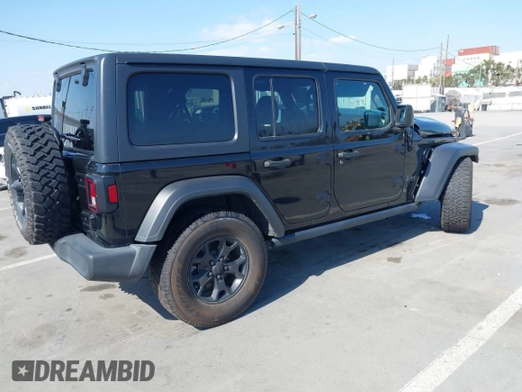 2020 Jeep Wrangler Unlimited Freedom with VIN 1C4HJXDG0LW238819, listed as a IAAI auction lot 42139357 with 67,619 mi miles and . Bid and sale history available at DreamBid. Image 4.