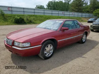 2000 Cadillac Eldorado ESC z VIN 1G6EL12Y4YU157205, wystawiony jako Copart lot #60085545 z przebiegiem 126 670 mil mil oraz Czysty tytuł • Clean title. Historia ofert i sprzedaży dostępna na DreamBid. Obrazek 1.