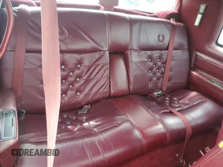1991 Cadillac Eldorado z VIN 1G6EL13B9MU604115, wystawiony jako Copart lot #52232425 z przebiegiem 95 570 mil mil oraz Szkody całkowita. Historia ofert i sprzedaży dostępna na DreamBid. Obrazek 10.