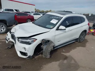 2018 BMW X1 xDrive28i with VIN WBXHT3C35J5K24695, listed as a IAAI auction lot 40932205 with 66,354 mi miles. Bid and sale history available at carsss.com. Image 16.