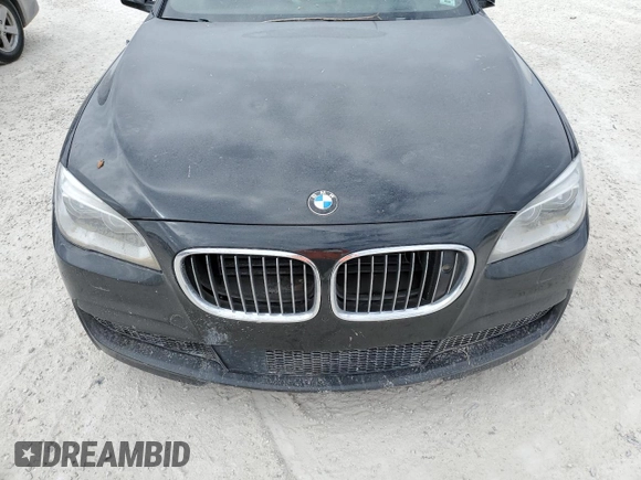 2015 BMW 7 Series 750Li xDrive z VIN WBAYF8C56FD654233, wystawiony jako Copart lot #83321604 z przebiegiem Nie podano mil oraz Nie do naprawy • Non repairable. Historia ofert i sprzedaży dostępna na DreamBid. Obrazek 11.