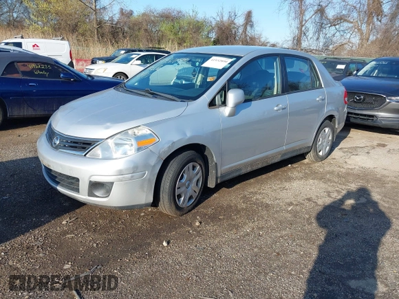 2011 Nissan Versa 1.8 S with VIN 3N1BC1AP5BL432979, listed as a IAAI auction lot 41932890 with 150,041 mi miles. Bid and sale history available at carsss.com. Image 2.