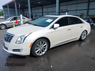 2013 Cadillac XTS Premium z VIN 2G61S5S35D9103948, wystawiony jako IAAI lot #42090444 z przebiegiem 154 728 mil mil oraz . Historia ofert i sprzedaży dostępna na DreamBid. Obrazek 17.