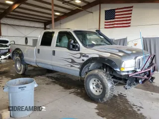 2001 Ford F-250 XL with VIN 1FTNW21F21EB83957, listed as a Copart auction lot 61602715 with 205,738 mi miles and Salvage title. Bid and sale history available at DreamBid. Image 4.
