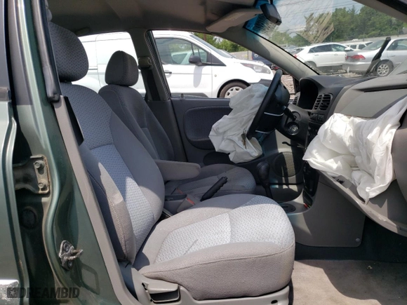 2002 Kia Rio with VIN KNADC123726158130, listed as a Copart auction lot 59104584 with 60,553 mi miles and Salvage Title. Bid and sale history available at carsss.com. Image 7.