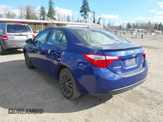 2014 Toyota Corolla L with VIN 5YFBURHE9EP070241, listed as a IAAI auction lot 41741565 with 122,797 mi miles and . Bid and sale history available at DreamBid. Image 3.