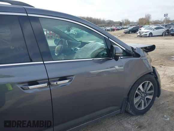 2016 Honda Odyssey Touring Elite z VIN 5FNRL5H99GB072860, wystawiony jako IAAI lot #42157603 z przebiegiem 221 449 mil mil oraz . Historia ofert i sprzedaży dostępna na DreamBid. Obrazek 6.