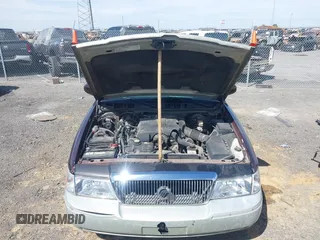 2003 Mercury Grand Marquis LS Premium z VIN 2MEFM75W73X650193, wystawiony jako IAAI lot #41803310 z przebiegiem 151 719 mil mil oraz . Historia ofert i sprzedaży dostępna na DreamBid. Obrazek 10.