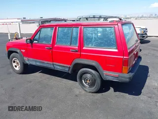 1996 Jeep Cherokee Sport with VIN 1J4FT68S0TL225719, listed as a IAAI auction lot 42121351 with 237,602 mi miles and . Bid and sale history available at DreamBid. Image 3.