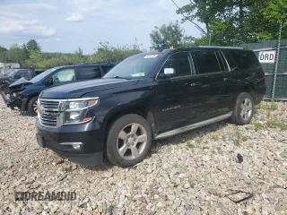 2015 Chevrolet Suburban LTZ with VIN 1GNSKKKC8FR199218, listed as a Copart auction lot 64147184 with 181,676 mi miles and Salvage Title. Bid and sale history available at DreamBid. Image 1.