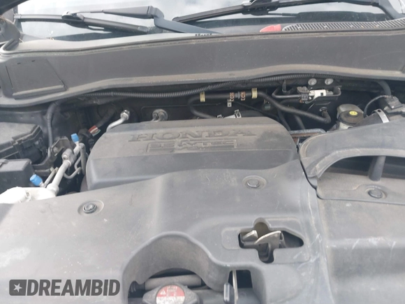 2013 Honda Pilot EX-L with VIN 5FNYF4H77DB047995, listed as a IAAI auction lot 41648290 with 154,926 mi miles and . Bid and sale history available at DreamBid. Image 10.
