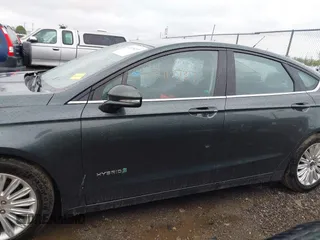 2015 Ford Fusion SE Hybrid with VIN 3FA6P0LU9FR184907, listed as a IAAI auction lot 42119737 with 153,255 mi miles and . Bid and sale history available at DreamBid. Image 15.