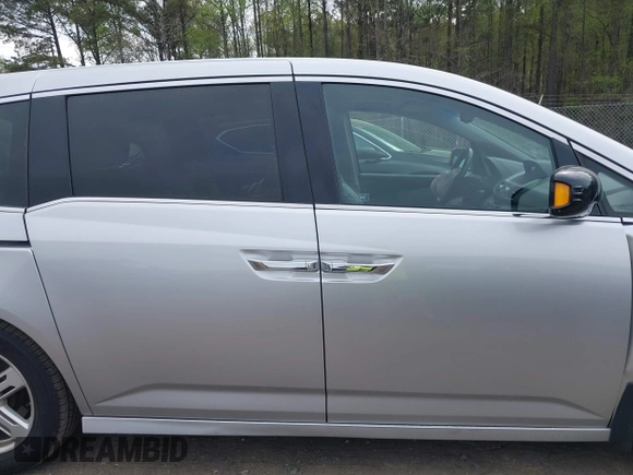2012 Honda Odyssey Touring with VIN 5FNRL5H98CB026754, listed as a IAAI auction lot 41935562 with 165,626 mi miles. Bid and sale history available at carsss.com. Image 13.