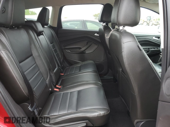 2015 Ford Escape Titanium z VIN 1FMCU0JXXFUA76092, wystawiony jako Copart lot #54824635 z przebiegiem 97 659 mil mil oraz Szkoda całkowita • Salvage title. Historia ofert i sprzedaży dostępna na DreamBid. Obrazek 11.