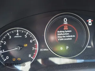 2021 Mazda 3 S z VIN JM1BPAAL8M1321402, wystawiony jako IAAI lot #41693911 z przebiegiem 35 144 mil mil oraz . Historia ofert i sprzedaży dostępna na DreamBid. Obrazek 16.