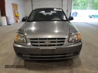 2004 Hyundai Accent z VIN KMHCF35C14U310393, wystawiony jako Copart lot #57840235 z przebiegiem 50 825 mil mil oraz Tytuł czysty. Historia ofert i sprzedaży dostępna na DreamBid. Obrazek 5.
