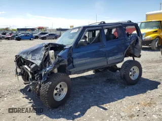 2001 Jeep Cherokee Sport z VIN 1J4FF48S71L555513, wystawiony jako Copart lot #55780315 z przebiegiem Nie podano mil oraz Szkoda całkowita • Salvage title. Historia ofert i sprzedaży dostępna na DreamBid. Obrazek 1.