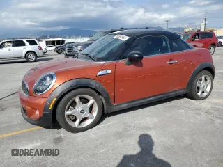 2013 MINI Coupe S z VIN WMWSX3C59DT466802, wystawiony jako Copart lot #56860965 z przebiegiem 88 053 mil mil oraz Szkoda całkowita • Salvage title. Historia ofert i sprzedaży dostępna na DreamBid. Obrazek 1.
