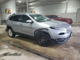 2016 Jeep Cherokee Limited with VIN 1C4PJMDB6GW162558, listed as a Copart auction lot 62741085 with 124,073 mi miles and Salvage title. Bid and sale history available at DreamBid. Image 4.