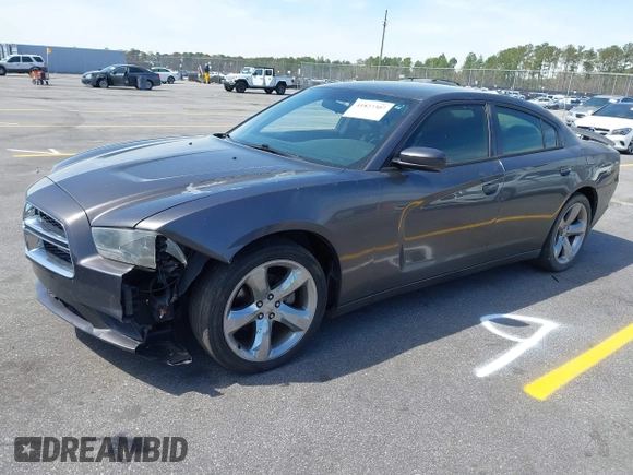 2014 Dodge Charger SE with VIN 2C3CDXBG0EH216023, listed as a IAAI auction lot 41827307 with 243,107 mi miles. Bid and sale history available at carsss.com. Image 2.