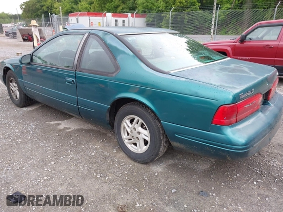 1996 Ford Thunderbird LX z VIN 1FALP62W9TH118637, wystawiony jako IAAI lot #42311641 z przebiegiem 96 361 mil mil oraz . Historia ofert i sprzedaży dostępna na DreamBid. Obrazek 3.