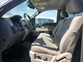 2010 Ford F-150 XL with VIN 1FTEW1C88AFA71473, listed as a Copart auction lot 61420085 with 143,965 mi miles and Salvage title. Bid and sale history available at DreamBid. Image 7.