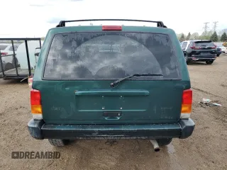 2000 Jeep Cherokee with VIN 1J4FF48S3YL149593, listed as a Copart auction lot 52489045 with 290,231 mi miles and Salvage title. Bid and sale history available at DreamBid. Image 6.