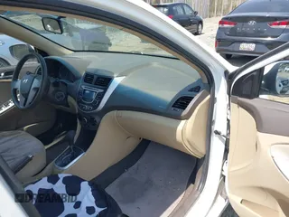 2013 Hyundai Accent GLS with VIN KMHCT4AEXDU532291, listed as a IAAI auction lot 42115374 with 179,848 mi miles and . Bid and sale history available at carsss.com. Image 5.