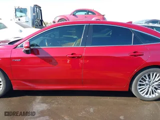 2019 Toyota Avalon Hybrid Limited with VIN 4T1B21FB8KU010221, listed as a IAAI auction lot 41470592 with 100,869 mi miles. Bid and sale history available at carsss.com. Image 14.