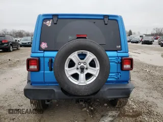2023 Jeep Wrangler Sport S with VIN 1C4HJXDG9PW543144, listed as a Copart auction lot 43745495 with 36,989 mi miles and Salvage Title. Bid and sale history available at DreamBid. Image 6.