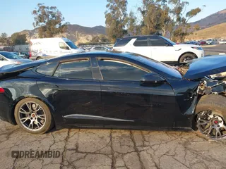 2022 Tesla Model S with VIN 5YJSA1E50NF462647, listed as a IAAI auction lot 41354668 with Not Provided miles and . Bid and sale history available at DreamBid. Image 12.