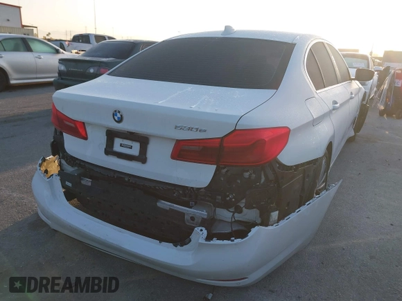 2020 BMW 5 Series 530e with VIN WBAJA9C08LCD41408, listed as a IAAI auction lot 41959134 with 112,733 mi miles and . Bid and sale history available at carsss.com. Image 4.