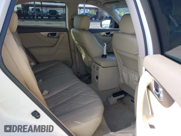 2010 Infiniti FX z VIN JN8AS1MUXAM800384, wystawiony jako IAAI lot #42458960 z przebiegiem 142 976 mil mil oraz . Historia ofert i sprzedaży dostępna na DreamBid. Obrazek 8.