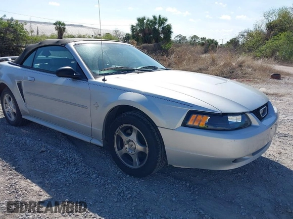 2003 Ford Mustang Deluxe z VIN 1FAFP44453F379157, wystawiony jako IAAI lot #41612382 z przebiegiem 107 599 mil mil oraz . Historia ofert i sprzedaży dostępna na DreamBid. Obrazek 1.