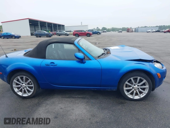 2006 Mazda MX-5 Miata Touring z VIN JM1NC25FX60102209, wystawiony jako IAAI lot #41940771 z przebiegiem 165 003 mil mil oraz . Historia ofert i sprzedaży dostępna na DreamBid. Obrazek 12.