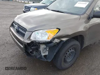 2009 Toyota RAV4 with VIN JTMZF33V995001985, listed as a IAAI auction lot 41932410 with 113,713 mi miles. Bid and sale history available at carsss.com. Image 6.