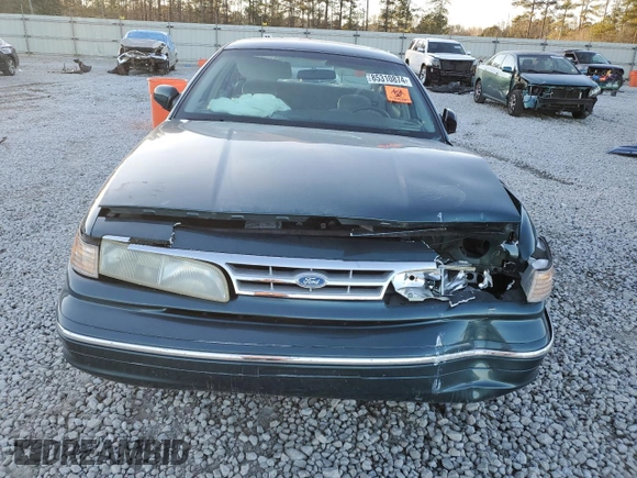 1996 Ford Crown Victoria LX z VIN 2FALP74W0TX205507, wystawiony jako Copart lot #85310874 z przebiegiem 51 646 mil mil oraz Szkoda całkowita • Salvage title. Historia ofert i sprzedaży dostępna na DreamBid. Obrazek 5.