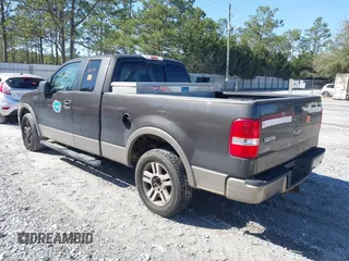 2005 Ford F-150 XLT with VIN 1FTPX12575NA61851, listed as a IAAI auction lot 41713974 with 251,639 mi miles. Bid and sale history available at carsss.com. Image 3.