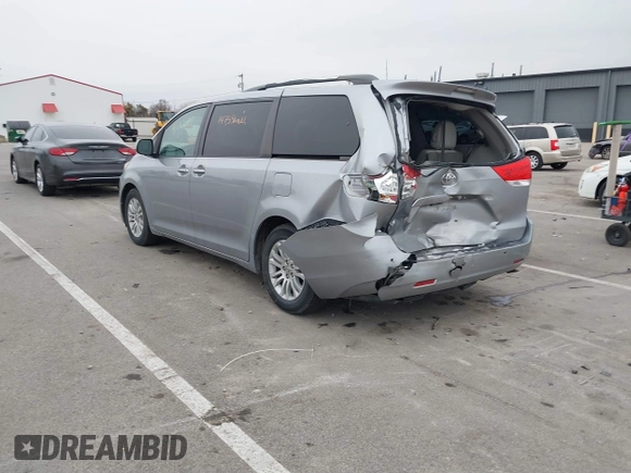 2011 Toyota Sienna XLE AAS with VIN 5TDYK3DC5BS150527, listed as a IAAI auction lot 41143189 with 147,551 mi miles and . Bid and sale history available at DreamBid. Image 3.