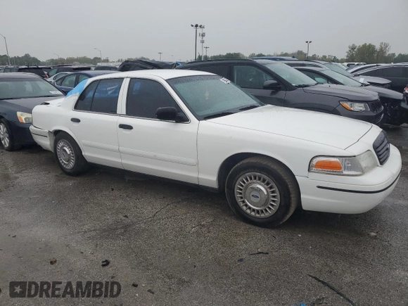 1999 Ford Crown Victoria Police z VIN 2FAFP71W7XX156457, wystawiony jako Copart lot #71623954 z przebiegiem 123 313 mil mil oraz Szkody całkowita. Historia ofert i sprzedaży dostępna na DreamBid. Obrazek 4.