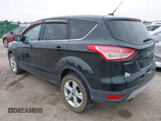 2014 Ford Escape SE with VIN 1FMCU9G96EUD61299, listed as a IAAI auction lot 42411069 with 147,957 mi miles and . Bid and sale history available at DreamBid. Image 3.