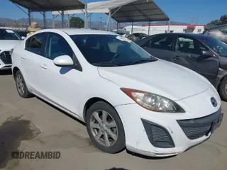 2010 Mazda Mazda3 i Touring with VIN JM1BL1SG6A1241024, listed as a IAAI auction lot 41857371 with 140,603 mi miles. Bid and sale history available at carsss.com. Image 1.